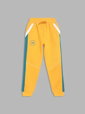 Blue Giraffe Boys Yellow Colorblocked Straight Fit Mid-Rise Joggers Style Trackpant
