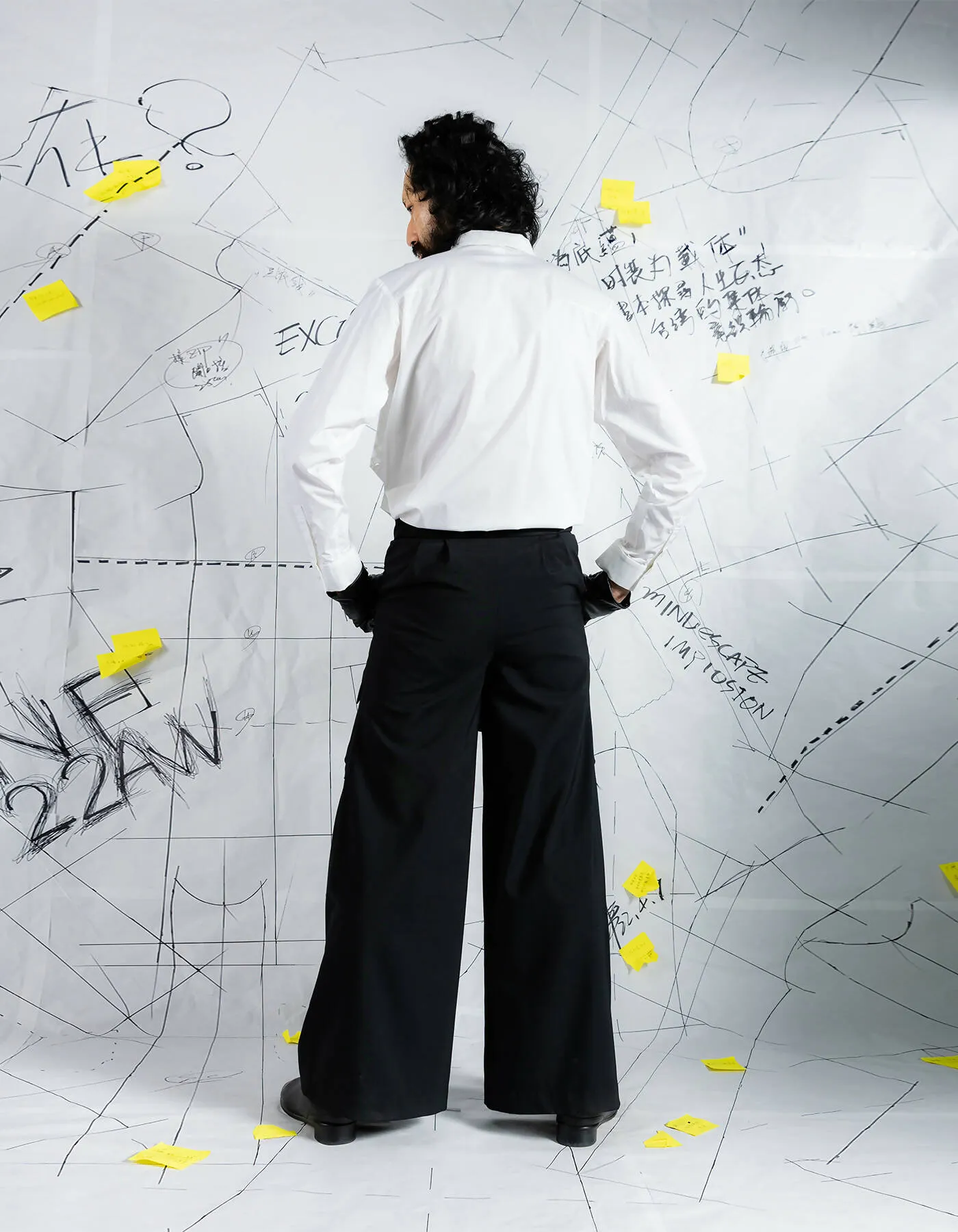Deconstructed Floor-To-Ceiling Trousers With Cutouts